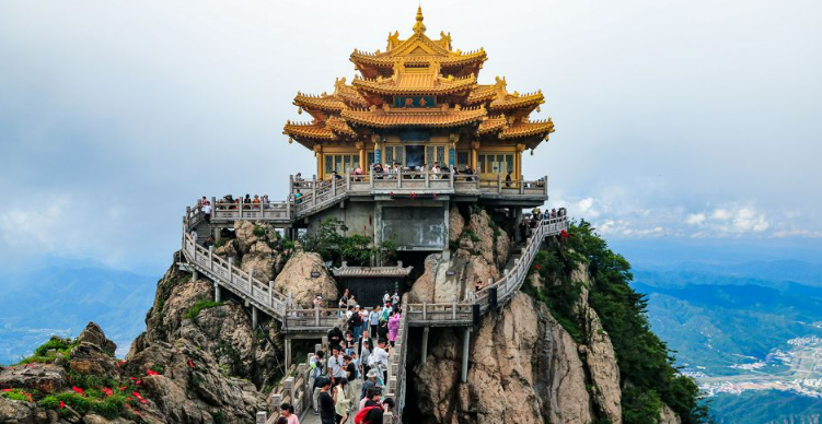 On July 2, 2025, tourists travel to Luoyang, Henan Province, China, for summer vacation and explore the Laojun Mountain picturesque area. Group Visual China/Getty Images